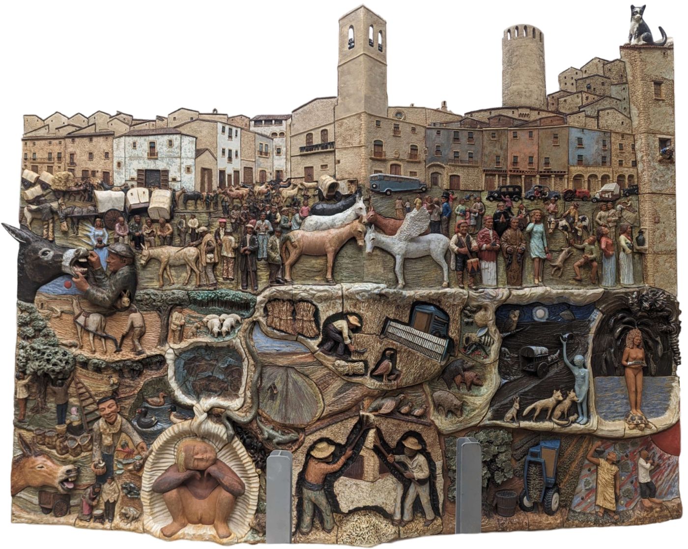 El somni, el mural ceràmic d'Enric Orobitg a Verdú, amb les escenes de la vida al camp i de la Fira d'animals de peu rodó